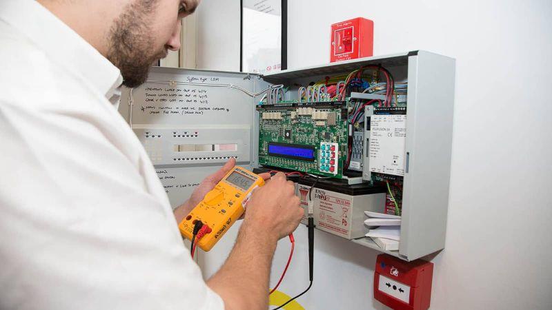 A S Safetyzone technician servicing a fire safety system during AMC in Mumbai